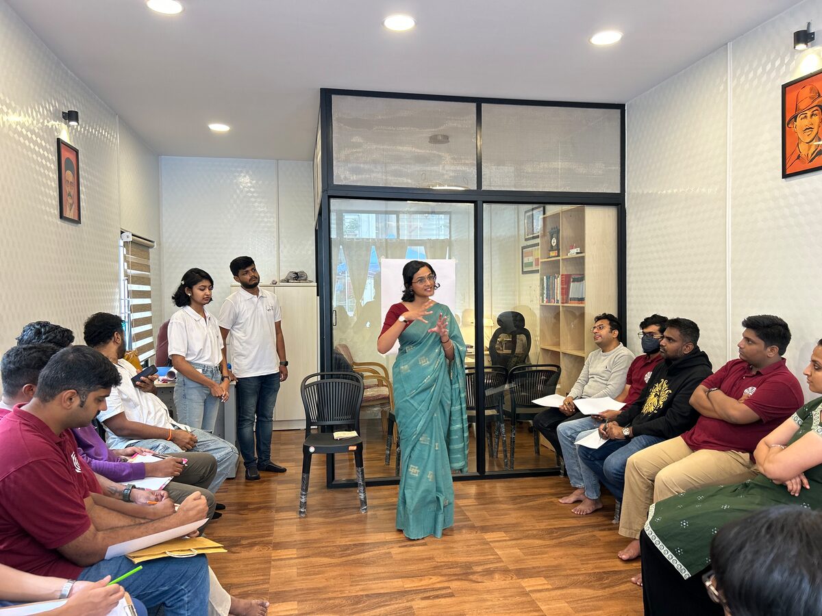 A facilitator leading a session with Youth for Parivarthan